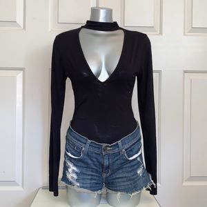 Black low cut cleavage body suit comfy bodysuit